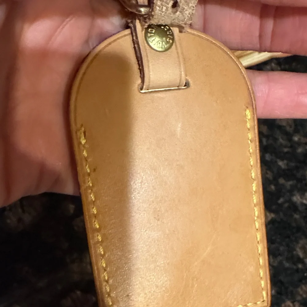 Louis Vuitton Beige Leather Tag